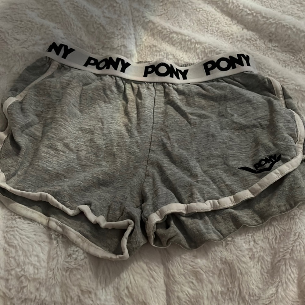 Pony is the brand, Size is XS. And color is grey.